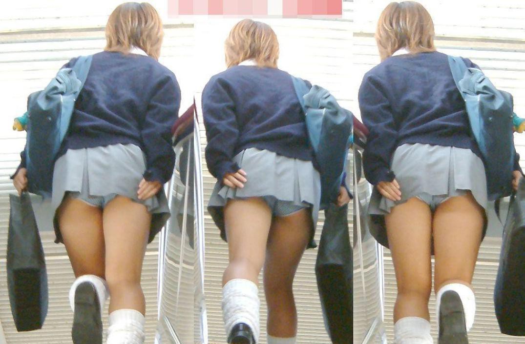 【エロ画像】耳元で無駄だと教えたくなるスカート隠し失敗パンチラ